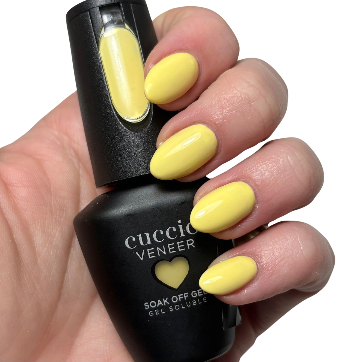 Cuccio Feeling Sunlit Smirk Sun Yellow gel nail polish applied on nails with glossy finish