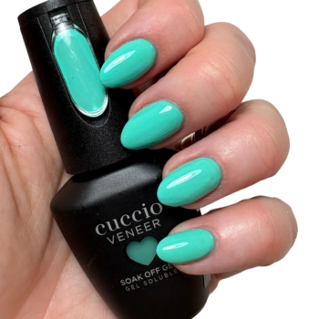 Cuccio Feeling Sea Me Go Aqua Blue gel nail polish applied on nails with glossy finish