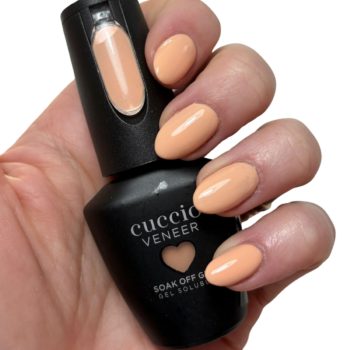 Cuccio Happy Haze Peach Nude gel nail polish applied on nails with glossy finish