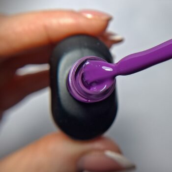 Cuccio Mesmerized gel nail polish brush showing medium purple highly pigmented colour