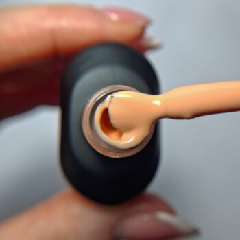 Cuccio Happy Haze gel nail polish brush showing a peachy nude highly pigmented colour