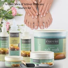 Artisan Shea & Vetiver Pedicure Starter Kit featuring Cuccio Naturale spa products, including salt soak, callus softener, cuticle softener, exfoliation scrub, hydrating treatment, and lotion, arranged with manicured hands and feet and floral accents.